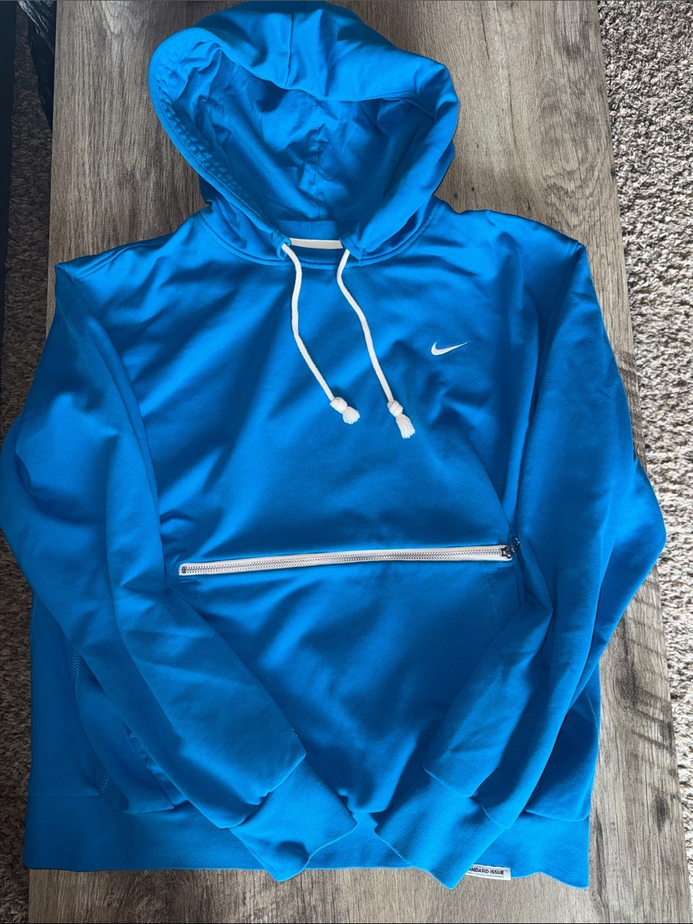 Nike Blue Hooded Pullover with White Swoosh and Zippered Pocket